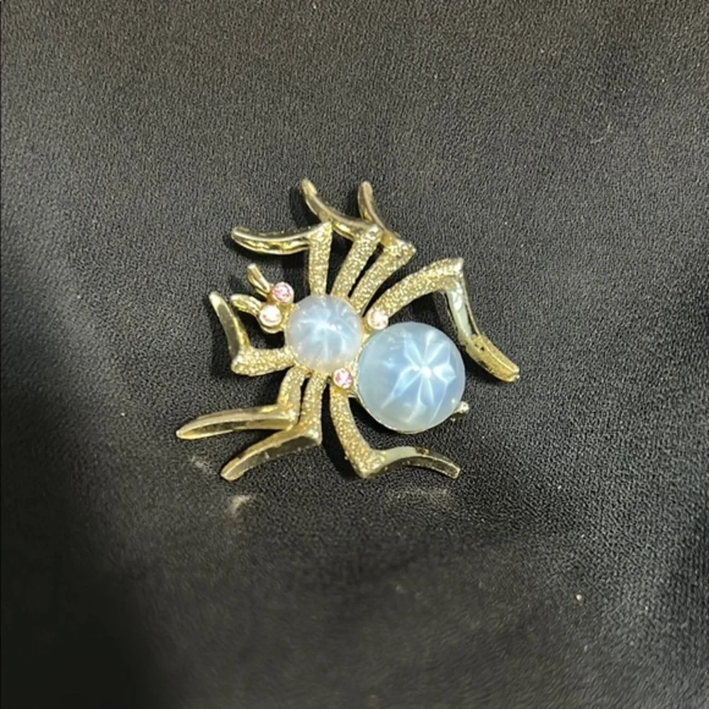 Elegant Gold and Blue Spider Brooch